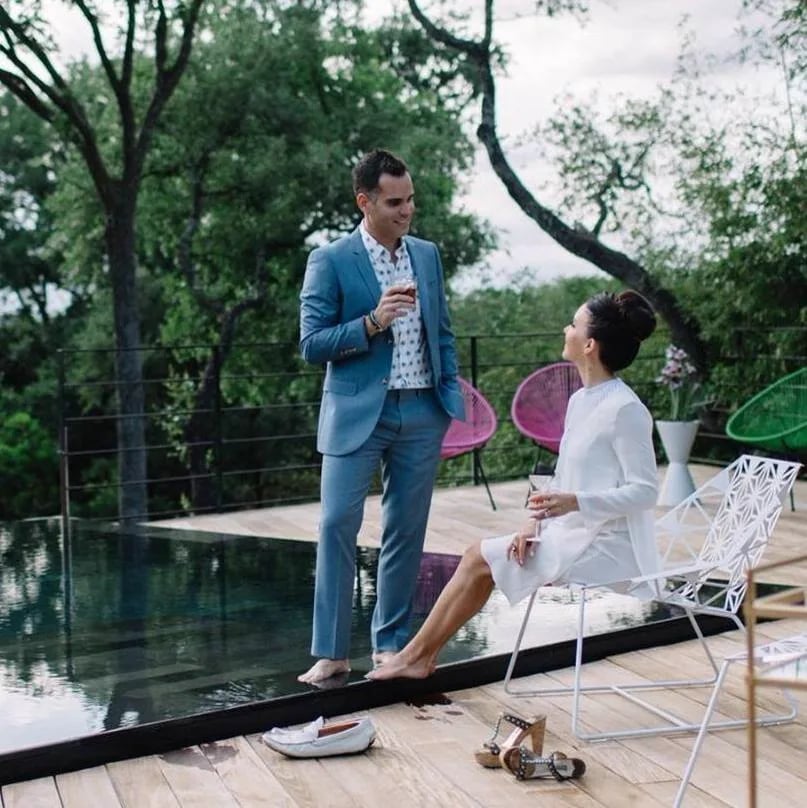 Jan and Keli Sotelo beside a Modern Pools infinity pool in the Austin Hill Country