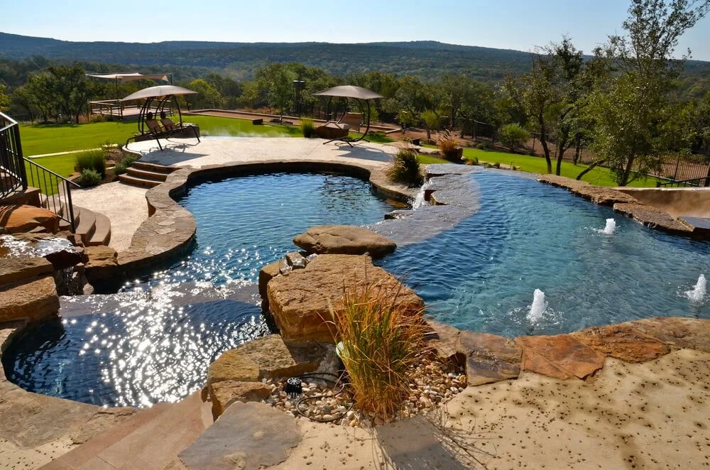 Spillways custom pool by Modern Pools in Hill Country