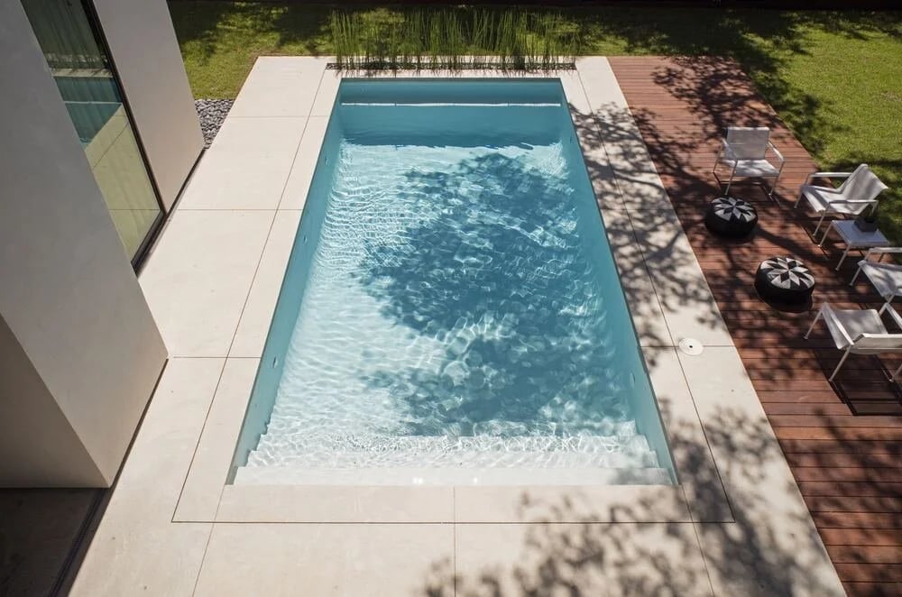 Backyard fiberglass pool on a flat Austin lot