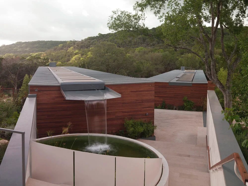 Cascading Creek custom pool by Modern Pools in Hill Country